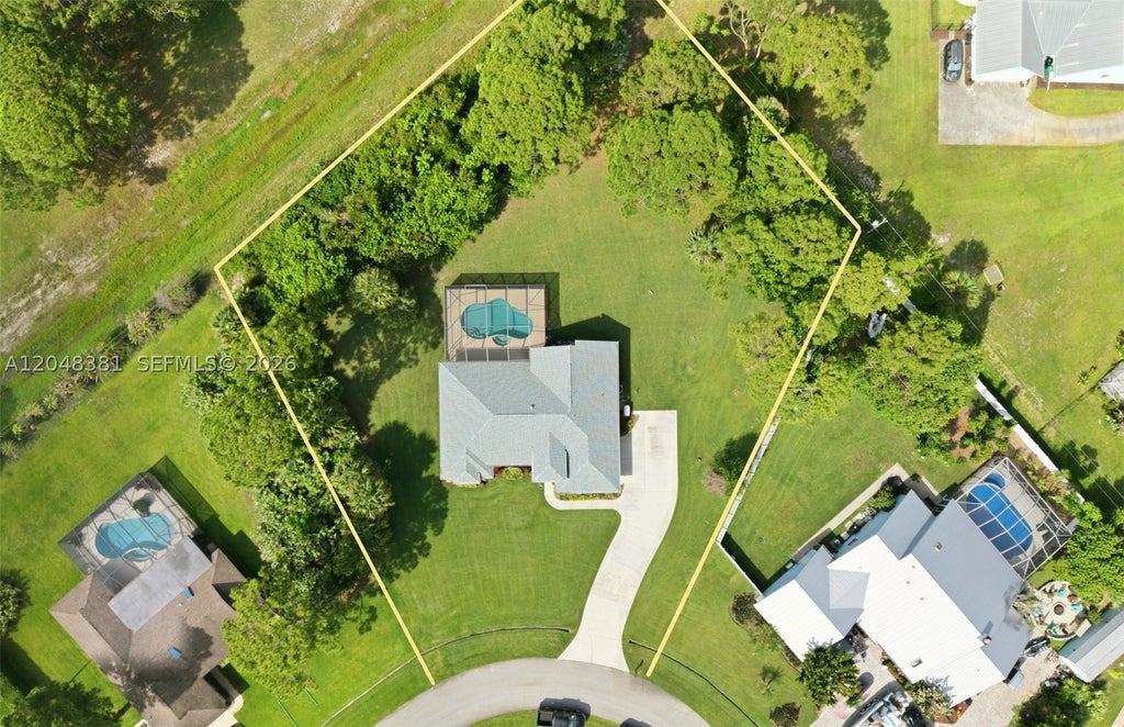 Photo of 2472 SE Hillard Rd, Port St Lucie, FL 34952 (MLS # A12048381)