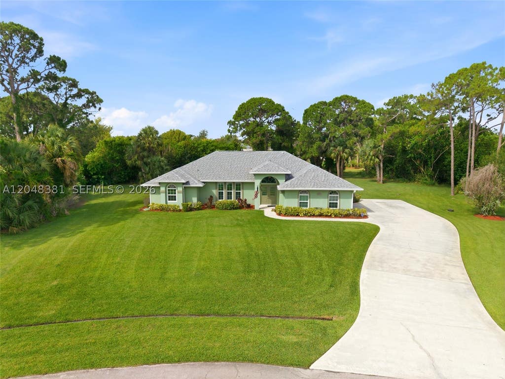 Photo of 2472 SE Hillard Rd, Port St Lucie, FL 34952 (MLS # A12048381)