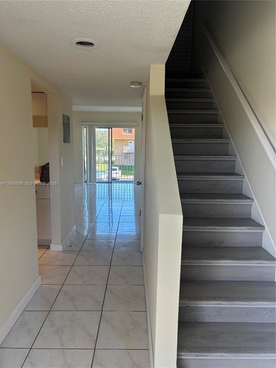 Corner unit in the desirable Sweetwater area, ready to move in. Features a brand-new kitchen, new bathroom cabinets, and new laminated flooring throughout. Centrally located with easy access to public transportation and just minutes from FIU. Excellent investment opportunity.