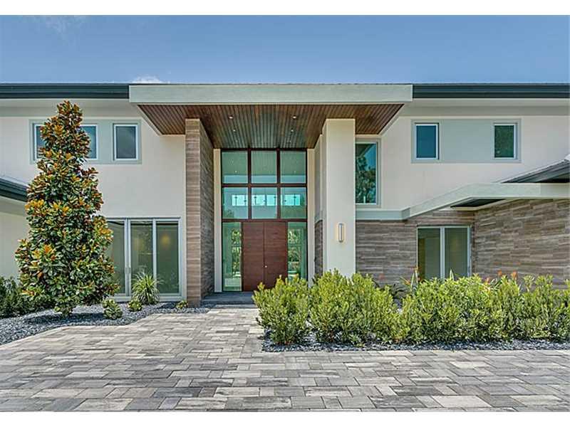 Brand New construction on Pinecrest millionaire's row!Sleek & clean-line modern architectural design. Dramatic & imposing entry. Brilliant use in walls of glass uniting indoor & outdoor living.Cutting edge & sumptuous finishes.Lavish master suite.Gourmet dream kitchen,library,media room,in addition to grand florida/play room. Sep ensuite guestquarter. Cabana/summer-kitchen. Spectacular oversized pool/Jacuzzi. Marble floor.Elevator. Lush gated acre lot on beautiful & sought-after street. Fabulous!Must see!