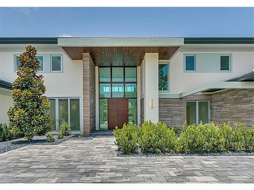 Brand New construction on Pinecrest millionaire's row!Sleek & clean-line modern architectural design. Dramatic & imposing entry. Brilliant use in walls of glass uniting indoor & outdoor living.Cutting edge & sumptuous finishes.Lavish master suite.Gourmet  dream kitchen,library,media room,in addition to grand florida/play room. Sep ensuite guestquarter. Cabana/summer-kitchen. Spectacular oversized pool/Jacuzzi. Marble floor.Elevator. Lush gated acre lot on beautiful & sought-after street. Fabulous!Must see!