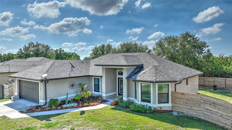 Better than new! Decorated like an HGTV pro- panels and textured walls make this 3 bedroom 2 bath home with office  a real eye catcher.  Big pantry, dual sinks in master, granite countertops, stainless steel appliances make this kitchen a chef's dream.  This home is in an already established neighborhood with other newer construction and is close to schools, shopping and 30 minutes from airport.  The backyard has been all fenced in and is ready for entertaining or to put in a pool. Don't miss out on this opportunity to own a beautiful home already decorated and ready for occupancy!