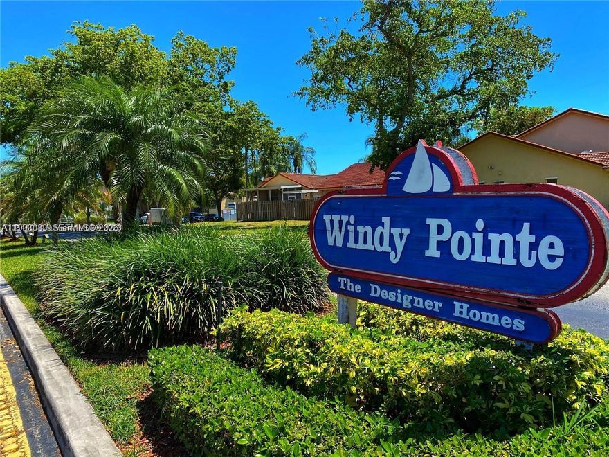 Spacious 1 story 2-bedroom 2 bath villa in Windy Pointe. Overlooking the garden, enjoy the common areas that this beautiful community has to offer. Kids playground, assigned parking, running rails, pool. Property has a private covered screened patio great for entertainment; bedrooms have sliding doors connecting to the patio which also has access to the outside. Laundry room, kitchen cabinets just 2 years old, SS appliance, eat-in kitchen, all tile. Excellent location, close to school restaurants, business and within a 10-minute drive to the beautiful Black Point Mariana and Pier which is a great venue for gatherings, weekend activities and entertaining.