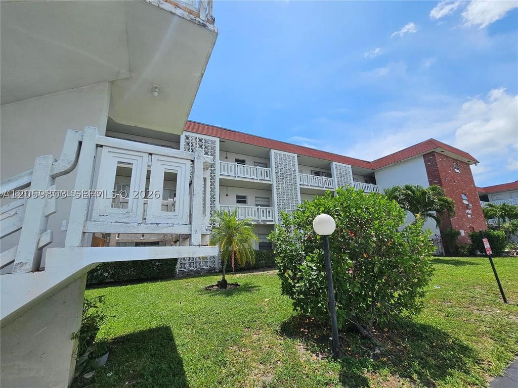 Photo of 1490 NW 43rd Ave #301, Lauderhill, FL 33313 (MLS # A12059803)