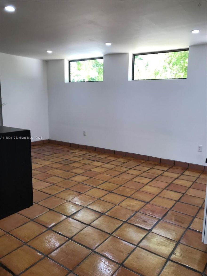 Experience this beautiful efficiency in Miami Springs. This cozy private, gated efficiency welcomes you with clay tiles throughout and comes equipped with a refrigerator, sink, and a/c mini split. Enjoy unwinding in the outdoor screened patio. Water and electricity is included in the rental payment.