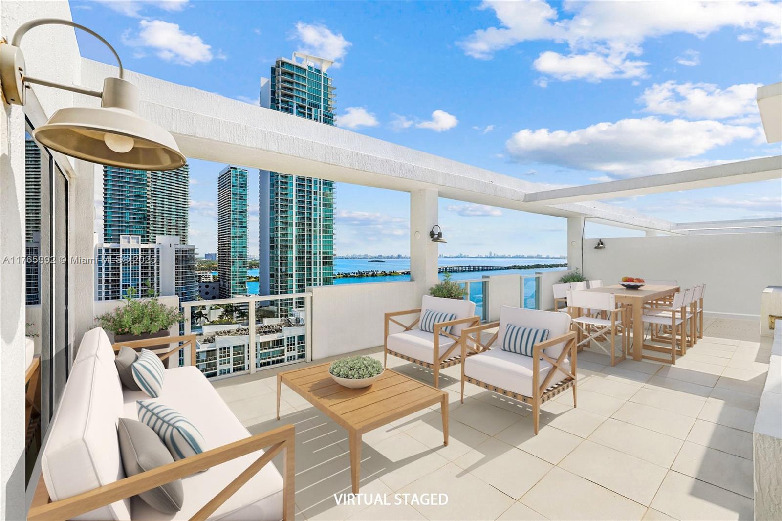 Stunning one-of-a-kind penthouse residence with incredible panoramic skyline and bay views. This jaw dropping unit comes with 3-bed/2-bath, high end kitchen with Bosch appliances. European-style bath fixtures, marble bathrooms, spacious closets, private rooftop terrace with a hot tub. 2 Deeded parking spaces. CRIMSON is a Boutique Bayfront LEED-certified building that includes: pool, state-of-the-art fitness center, cybercafé, lounge, movie theater, dog park, concierge services, business center, yoga room, car charging stations and private boardwalk overlooking the intracoastal bay. Centrally located in the booming and trendy Edgewater district, close to designer shops, theaters, galleries, cafes, and restaurants in Midtown, Wynwood and Downtown. Great opportunity