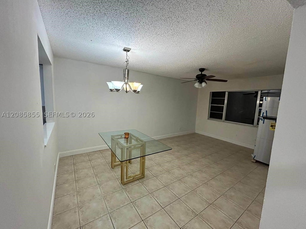 Photo of 7503 NW 44th Ct #10, Coral Springs, FL 33065 (MLS # A12085855)