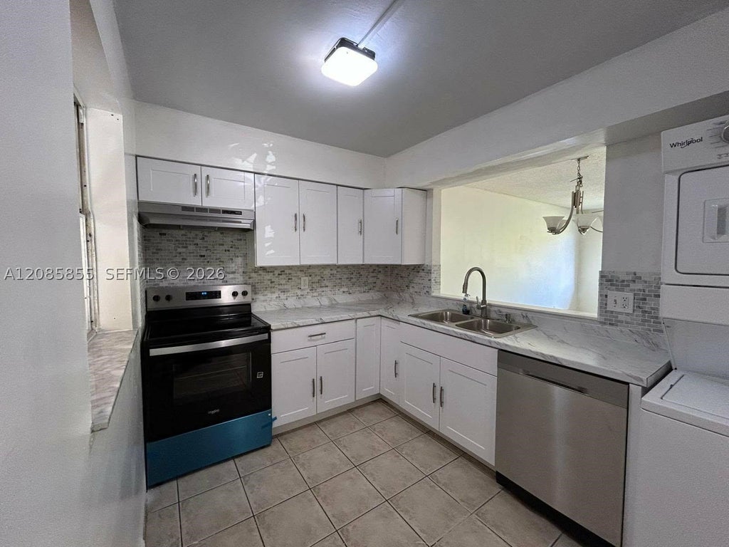 Photo of 7503 NW 44th Ct #10, Coral Springs, FL 33065 (MLS # A12085855)