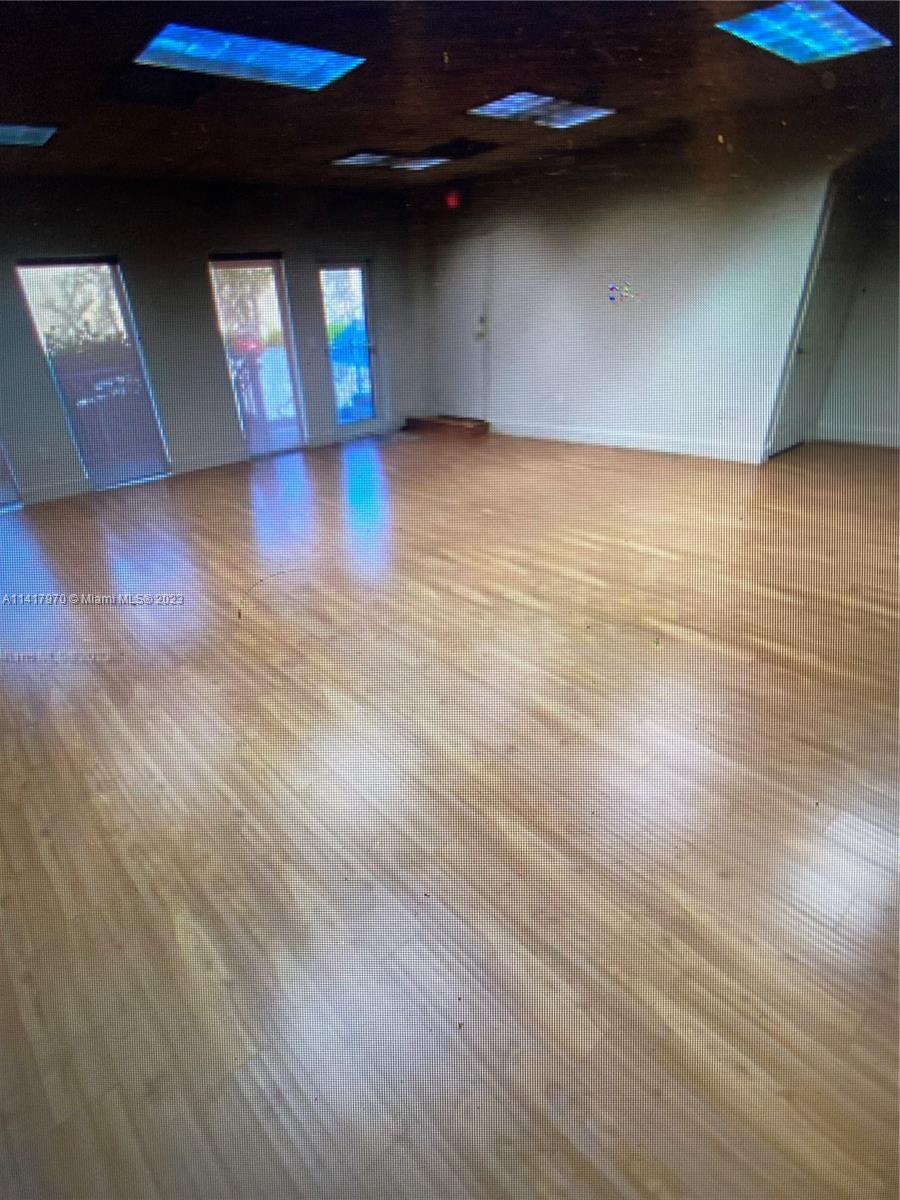 Great Location!!! Spacious office space for rent, one floor, there are two bathrooms in the first floor.bright space could be use as an office. space has vinyl floor warehouse is not Included, building has 4 parking spaces. modified gross lease.