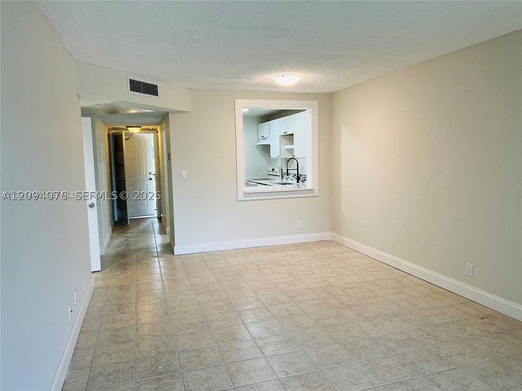 Photo of 8025 S Colony Cir S #210, Tamarac, FL 33321 (MLS # A12094076)