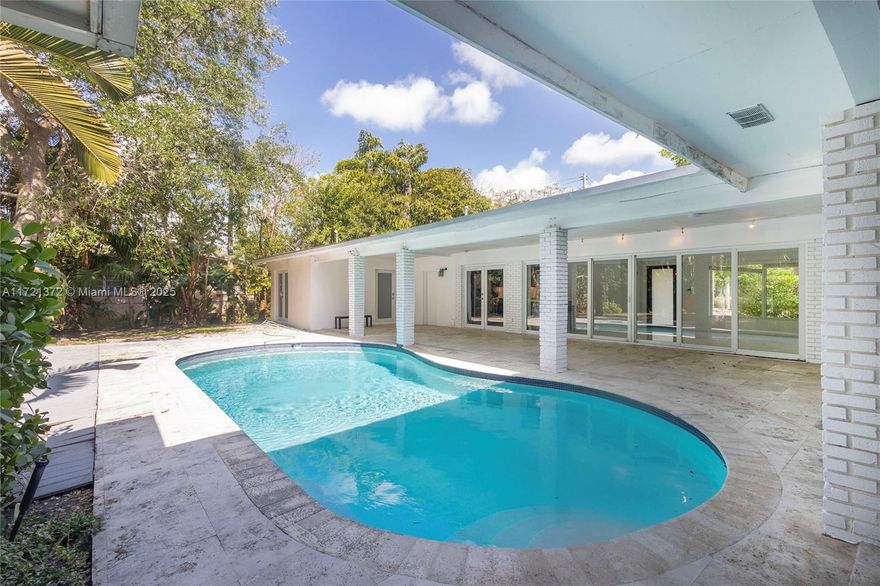 Beautifull 3-bedroom, 3-bathroom home with an additional versatile room — ideal as an office, guest room, or kids' playroom or what your imagination would call for — with its own private entrance. This spacious residence offers 2,286 sq. ft. of living space (3,259 total sq. ft.) on an expansive 18,290 sq. ft. lot, surrounded by lush landscaping for ultimate privacy. Features include impact windows, ceramic floors, and an enclosed 2-car garage. The outdoor area is perfect for entertaining, featuring a covered patio and a pool. Conveniently located near top public and private schools, this home is a rare find. Don’t miss out on this exceptional opportunity!