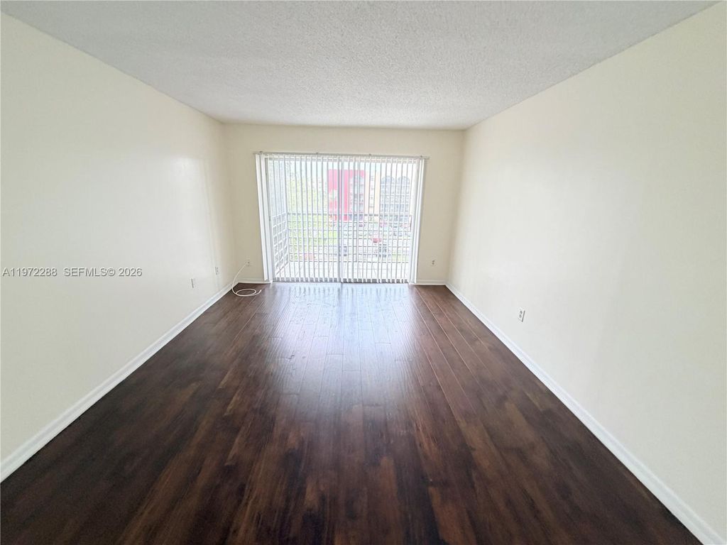 Photo of 2800 NW 56th Ave #F403, Lauderhill, FL 33313 (MLS # A11972288)