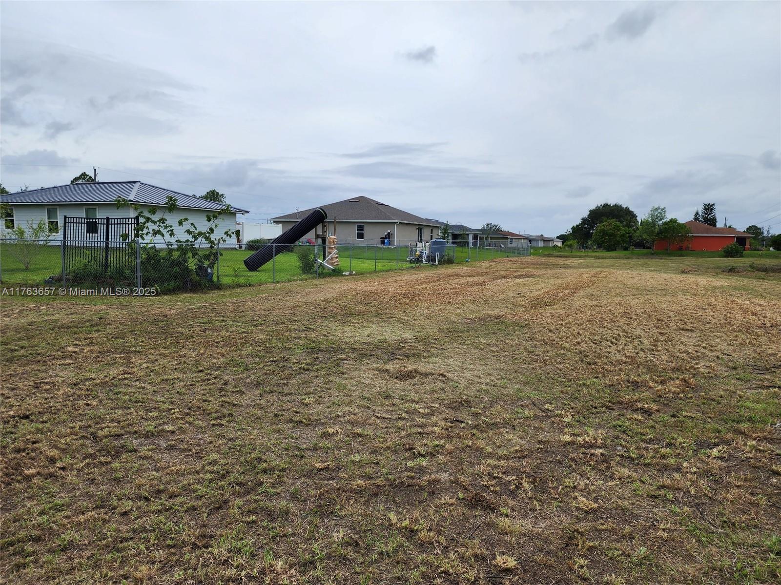 Wonderful 1/2 acre corner lot! Build your dream home! Priced to sell quick!