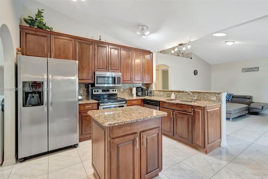 Photo of 4533 SW Cacao St, Port St Lucie, FL 34953 (MLS # A11987097)