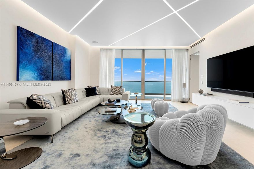 This luxury designer 3BR/3+1BA unit is on the 49th floor of the exclusive Residences by Armani Casa in Sunny Isles Beach, featuring sunrise & sunset terraces w/stunning city & ocean views. Offers 2,716 SF, exquisite Calacatta honed marble, built in Sonos speaker system, frameless doors, custom wood paneling & lighting, venetian plaster walls, & engineered European oak floors & Arkimodel closets in all bedrooms. Spacious open living room & dining layout w/stretch ceiling LED lights & sleek kitchen w/center island & top-of-the-line Wolf & SubZero appliances. The principal bedroom sports custom wallpaper, large closet, direct terrace access & bathroom w/frameless glass shower & sunken spa tub. 2 other BRs have en-suite bathrooms, laundry room & 3 valet parking spaces. 5-star Armani amenities.