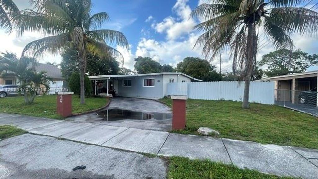Photo of 3235 NW 2nd St, Lauderhill, FL 33311 (MLS # A12021470)