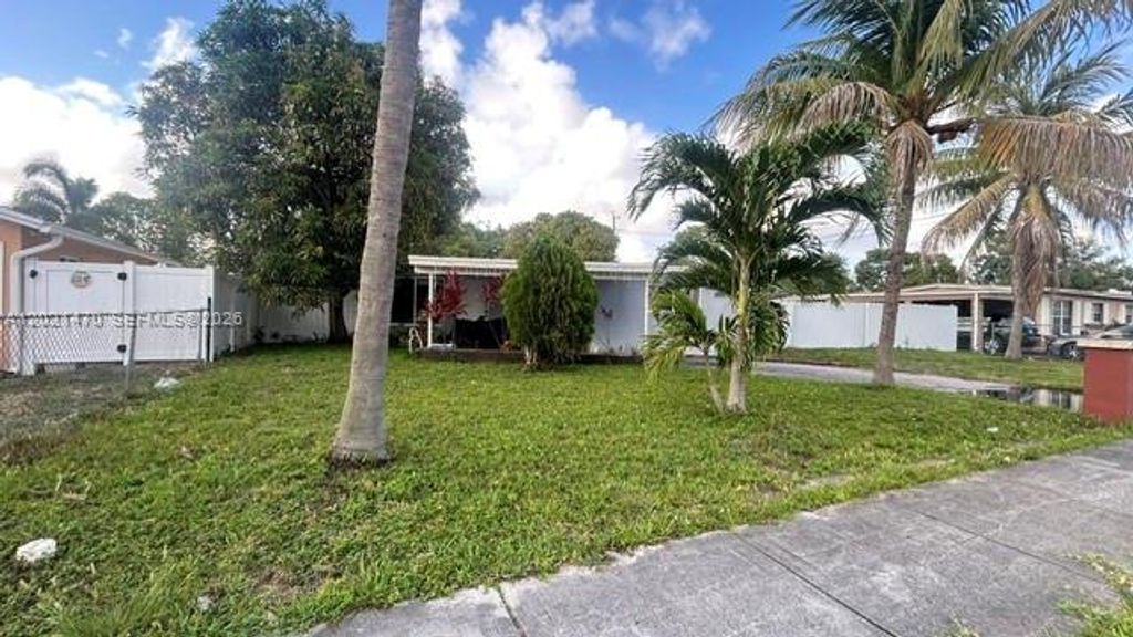 Photo of 3235 NW 2nd St, Lauderhill, FL 33311 (MLS # A12021470)