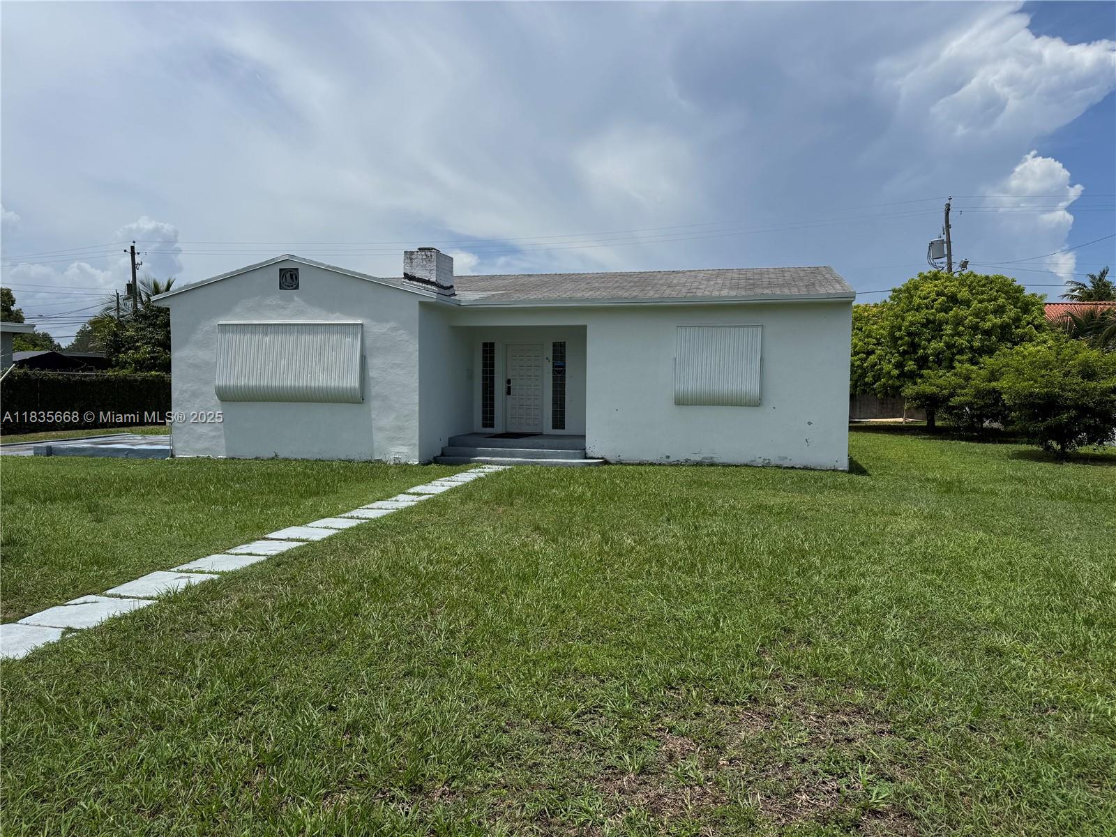 Now available for lease: a unique opportunity to rent a single-family residence being used as a commercial office space. This versatile property features 3 private offices (formerly bedrooms), 1 bathroom, a kitchen area, and a dedicated conference room, ideal for professional businesses. Situated just off Krome Avenue and 14th Street on a high-traffic corridor surrounded by shopping centers and local businesses, this location offers excellent visibility and convenience. The property is fully fenced and was previously used as a CPA office. Zoned B1A, it presents a great opportunity for a variety of office uses. Prospective tenants are advised to verify permitted uses with the city.