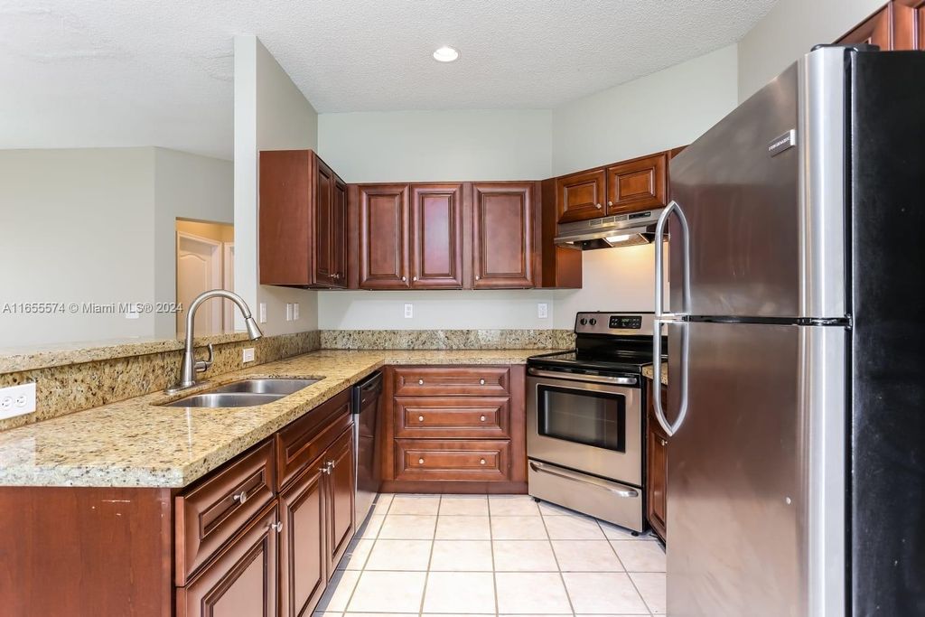 Photo of 751 NW 135th Way, Plantation, FL 33325 (MLS # A11655574)