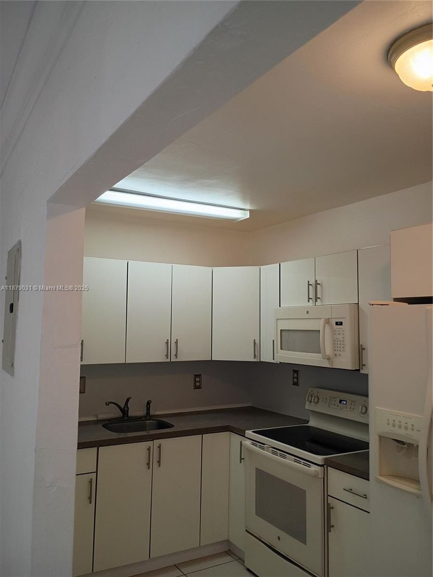 Show & Rent! Charming One bedroom One bath large closet in an adorable triplex. Brand new mini-split A/C in the living room.  Very bright and airy with a small enclosed yard.  Convenient location across the street from city community pool, basketball courts, activity center, city hall police & fire department. Close to shops, dining, Walmart, gas stations, 24-hour Laundromat, highways, houses of worship and minutes 10 minutes to beach. Tons of free street parking. Quick and easy approval to qualified applicants! Won't last! A must see!