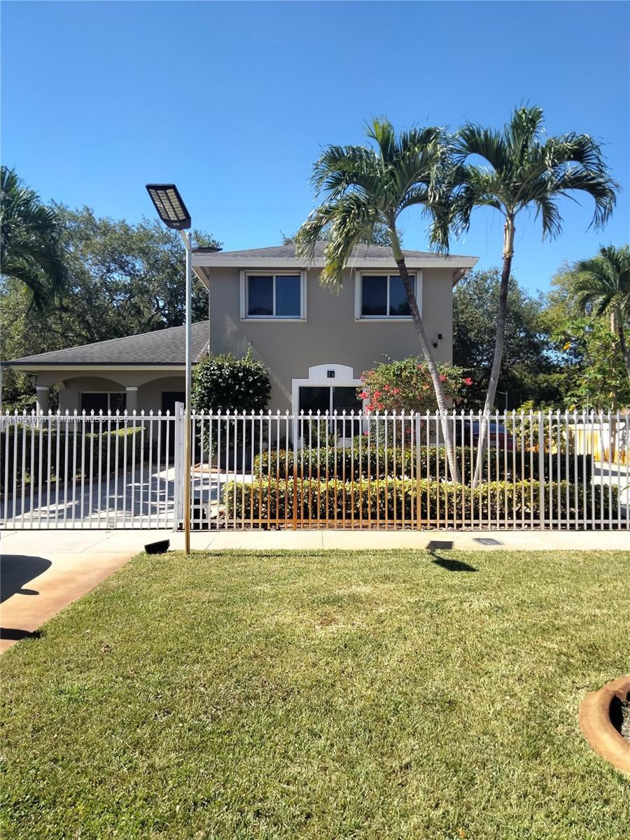 This 5 bedroom 4 bath home has all the bells and whistles, sitting on a corner lot with lush landscaping and commercial grade solar lights around the outside perimeter of the home.At entry you are greeted with an open floor plan, Living and dining combo, porcelain tile, glass stair rail and a state of the art kitchen to die for. Off the kitchen is a family room and half bath. The spacious first floor primary bedroom has custom built-in furniture and closet, while the bath has a jacuzzi tub, separate shower, and double vanity.The second level has 4 generous size bedrooms and 2 full baths.The French doors take you out into a 10,648 sq. ft. lot. The basketball pad doubles as a relaxing outside sitting area and still has room for a pool also parking for 8 cars in addition to the 2 car garage.