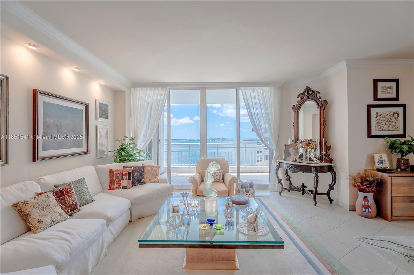 Enjoy Luxury Island living & stunning water views from your giant 1884 sq/ft home on Brickell Key. This beautiful unit has an inviting floorplan, large living & dining areas, a Kitchen w/ a balcony, Biscayne Bay & Island views, a large Master bedroom w/ a bay window & ensuite bathroom, tons of closet space, 2 & 1/2 baths, hurricane shutters & an area that can be converted into a 3rd bedroom or den. Two Tequesta is located on an Island Oasis named Brickell Key & has a state-of-the-art fitness center (w/ racquetball/squash, basketball, pilates, cross-fit, massage & aerobics areas), a bayside resort pool w/ hot tubs, BBQ's, a playroom, tennis, 2 conference rooms, free valet, 24/7 security, a Dog park, rentable storage lockers, & a bayside clubroom. LOW MAINTENANCE FEES (89.5 cents per sqft.)