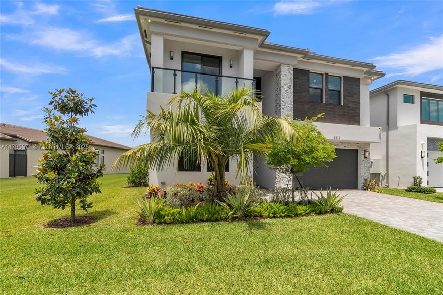 Located in Lotus Palm, one of the most prestigious communities offering a premier resort-style living experience, this 5-bedroom, 7-bathroom residence is set on an expansive oversized lot with breathtaking lake views and a tranquil atmosphere.
Inside, you’ll find soaring ceilings, and a thoughtfully designed open-concept layout that caters to modern living. The luxurious primary suite features a spa-inspired bath and stunning panoramic lake views for a true retreat experience.
Step outside to enjoy resort-style potential, with ample space to design the outdoor oasis of your dreams—whether it’s a pool, summer kitchen, or lush garden sanctuary.
This is a rare opportunity to own a breathtaking waterfront estate that blends sophistication, space, and the best of South Florida living.