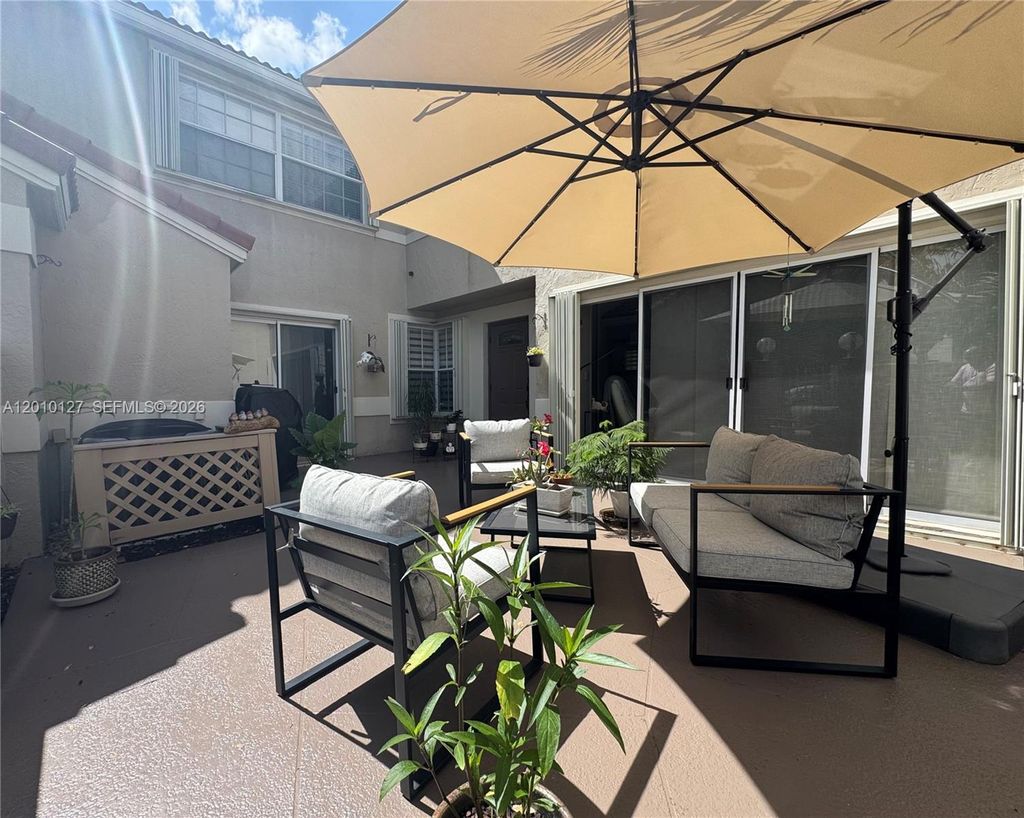 Photo of 11004 Neptune Dr, Cooper City, FL 33026 (MLS # A12010127)