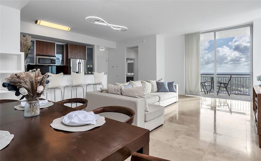 Don't miss the opportunity to enjoy breathtaking sunset views from the spectacular 24th floor Penthouse with wrap around balcony. This substantially updated residence offers a split floor plan with 2 large bedrooms and 2 bathrooms. Walk in Closets.Freshly polished marble floors throughout,
soaring 10+ foot ceilings with floor to ceiling sliding door and windows. Unit has been freshly painted.
With newly renovated bathroom vanities and lighting. The kitchen is accented with sleek black granite countertops.With only 4 units per floor, this exclusive penthouse offers privacy, elegance and stunning views. Building offers: 2 heated pools, jacuzzi, 2 gyms, clubroom, saunas, 24 hour concierge, 24 hour valet and 24 hour security patrol. FOB secured building. Walk to Dadeland Metro Station South, Publix, Trader Joes, Dadeland Mall and all up and coming restaurants.