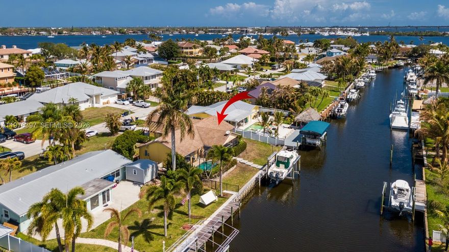 Experience the best of Florida waterfront living in the charming boating community of Lighthouse Point in Palm City. This 3-bedroom, 2-bath home sits on deep water and features a screened-in pool—perfect for enjoying the South Florida lifestyle year-round.
Boaters will appreciate the newer deep-water dock and seawall (2019), along with a new 16,000 lb boat lift installed in 2025. From your backyard, you're just minutes from the scenic St. Lucie River and quick access to the blue waters of the Atlantic Ocean, offering world-class boating and fishing. On the way home, stop by the local sandbar for a relaxing swim and soak in the coastal lifestyle.
Palm City is known for its top-rated schools, excellent dining, great shopping, and numerous parks for hiking, fishing, and outdoor recreation. Golf enthusiasts will love having nearly 70 golf courses within a 20-mile radius.
 Just a short drive away is historic downtown Stuart, nestled along the riverfront, where you can enjoy charming shops, waterfront dining, local art, and performances at the iconic Lyric Theatre. The area also hosts numerous festivals and community events throughout the year.
Combining charm, location, and true waterfront living, this Palm City gem offers the ideal Florida lifestyle—conveniently located just a short drive from Palm Beach International Airport.