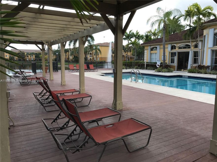 GET in this apartment while its still vacant! We have an excellent relationship with the association to expedite move-ins. Look no further, first floor entry, spacious 795 sq ft one bedroom apartment, with view of the community Lagoon. Very close to Pembroke Gardens Mall and excellent schools. Comes with 1 assigned parking spot. The complex offers serene, updated amenities such as pool, hot tub, gym, and access to the recreational center. Available to show at anytime, please message agent with your ID for access code.