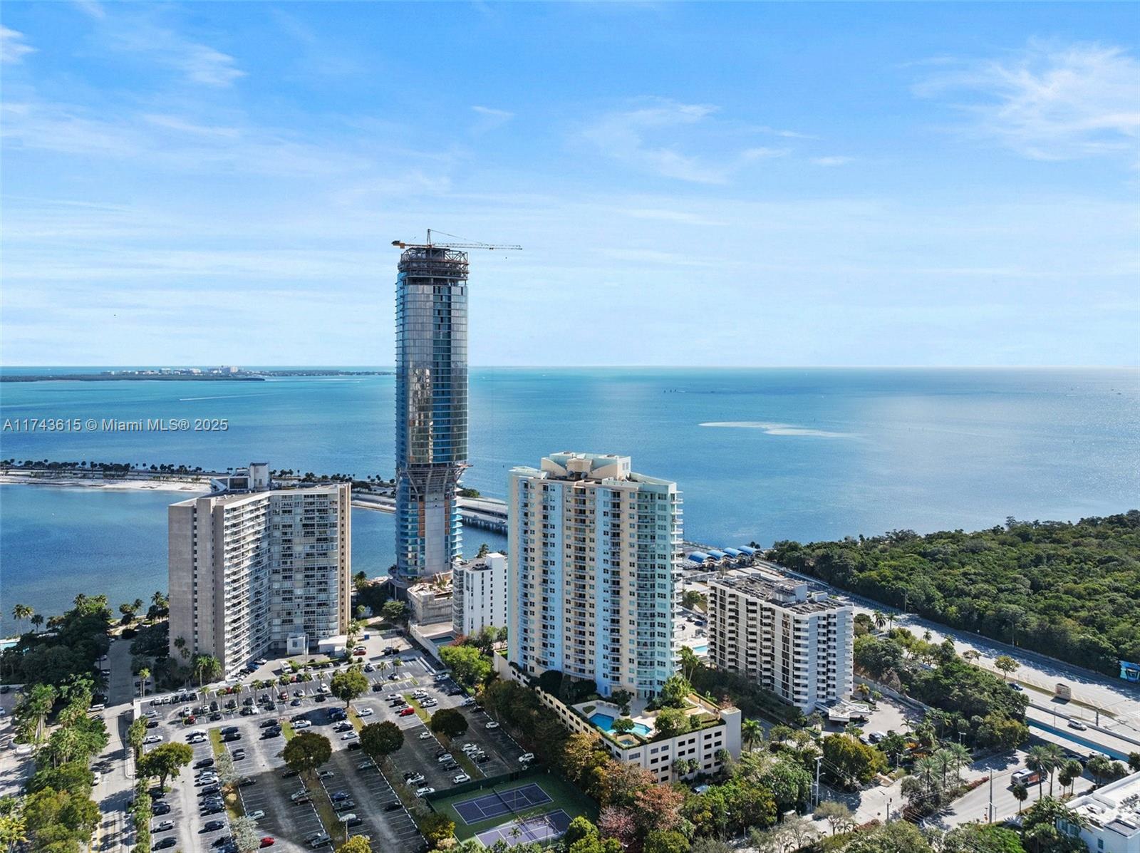 JUST REDUCED FOR A QUICK SALE!! Make this stunning corner condo your new home! This 2-bed, 2-bath split-plan features marble floors, vinyl in bedrooms, a gorgeous primary bath with double sinks, and customized walk-in closets. 2 parking spaces + storage. Enjoy skyline and bay views from the balcony. The modern kitchen has sleek stainless steel appliances, including Washer & Dryer. The Metropolitan offers top amenities: pool, spa, gym, playroom, club room, onsite management, and 24/7 concierge. HOA includes water, sewer, cable, internet, valet, and more. Close to top restaurants, the financial district, and hospitals. Come fall in love!