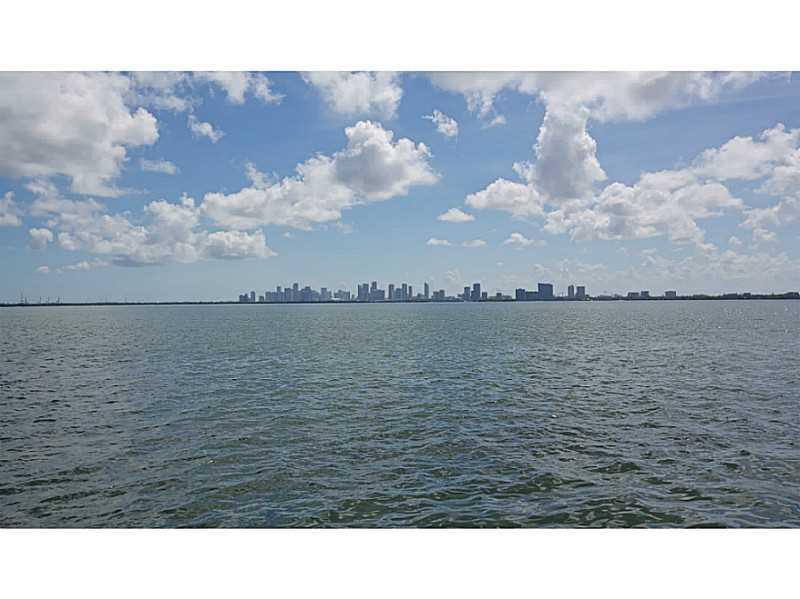 Enjoy the most incredible wide open bay and downtown Miami views! Build your dream home on this 9,000 SF lot or renovate the existing 1950's 3 bedroom 2 bathroom house. Current house features large Florida room, living room, separate eat-in kitchen, terra zzo floors, and 1 car garage.
