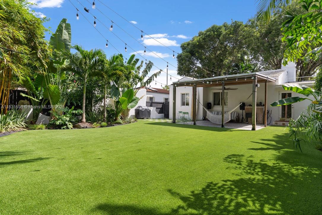 Step into this character-rich Miami Shores home, thoughtfully maintained to offer both elegance & comfort. East of Biscayne Blvd, this 2 BD/1 BA residence is bursting with charm & stylish upgrades, including original hardwood floors, vaulted ceilings, impact windows, updated AC & electrical panel, a functioning fireplace, & so much more. The sleek gas kitchen features a separate dining area & flows effortlessly to the main living area. The turfed backyard is a private oasis, ideal for entertaining or unwinding, with plenty of space for a pool. Centrally located near top schools, dining, & shops and in close proximity to Miami Beach, Downtown/Brickell, Wynwood, MIA airport, & more. With no HOA in a highly sought-after location, this is an incredible opportunity for an investor or end-user!