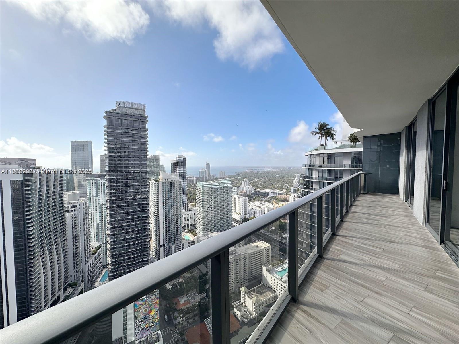 SLS Lux Brickell 5002 – Stunning 2BD/2BA + den on the 50th floor with private elevator entry and breathtaking bay/city views. Features split floor plan, floor-to-ceiling glass, gourmet kitchen with Sub-Zero/Wolf appliances, and spa-style primary suite. Resort-style amenities include rooftop pool, fitness center, spa, tennis court, and concierge. Steps from Brickell’s top dining, shopping, and nightlife.