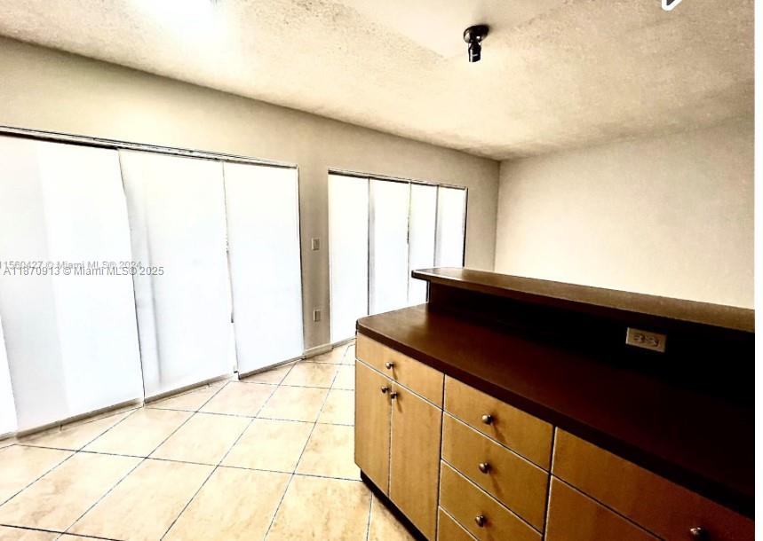 MILLER GARDENS CONDO - Residential Lease