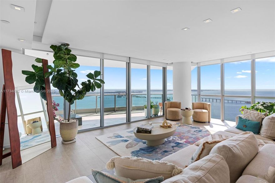 Sky-High Luxury with Breathtaking Views! This spectacular 4-bedroom, 4.5-bathroom south corner unit offers unobstructed, breathtaking panoramic views of Biscayne Bay to the east and the vibrant Brickell skyline to the west.A private elevator foyer entrance welcomes you into an expansive, light-filled layout featuring floor-to-ceiling windows,a refined mix of porcelain tile and wood flooring,and a modern kitchen with high-end SS appliances. Each bedroom boasts its own spa-like bathroom and a private terrace, offering east, south, and west exposures. Enjoy resort-style amenities, including an infinity pool, fitness center, a spa,and 24-hour concierge service. You’ll be just steps away from fine dining, shopping, and entertainment. Don’t miss this opportunity—schedule your private tour today!