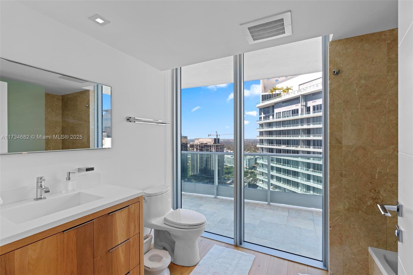JADE RESIDENCES AT BRICKE - Residential