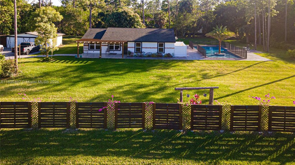 Photo of 17180 N 64th Pl N, Loxahatchee, FL 33470 (MLS # A11635402)