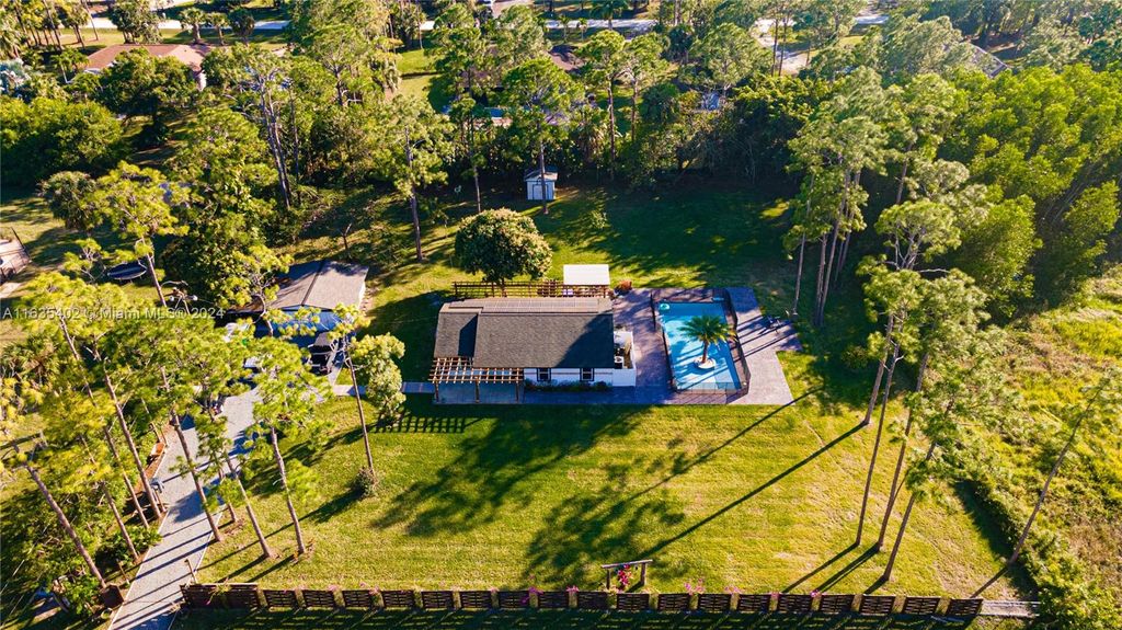 Photo of 17180 N 64th Pl N, Loxahatchee, FL 33470 (MLS # A11635402)