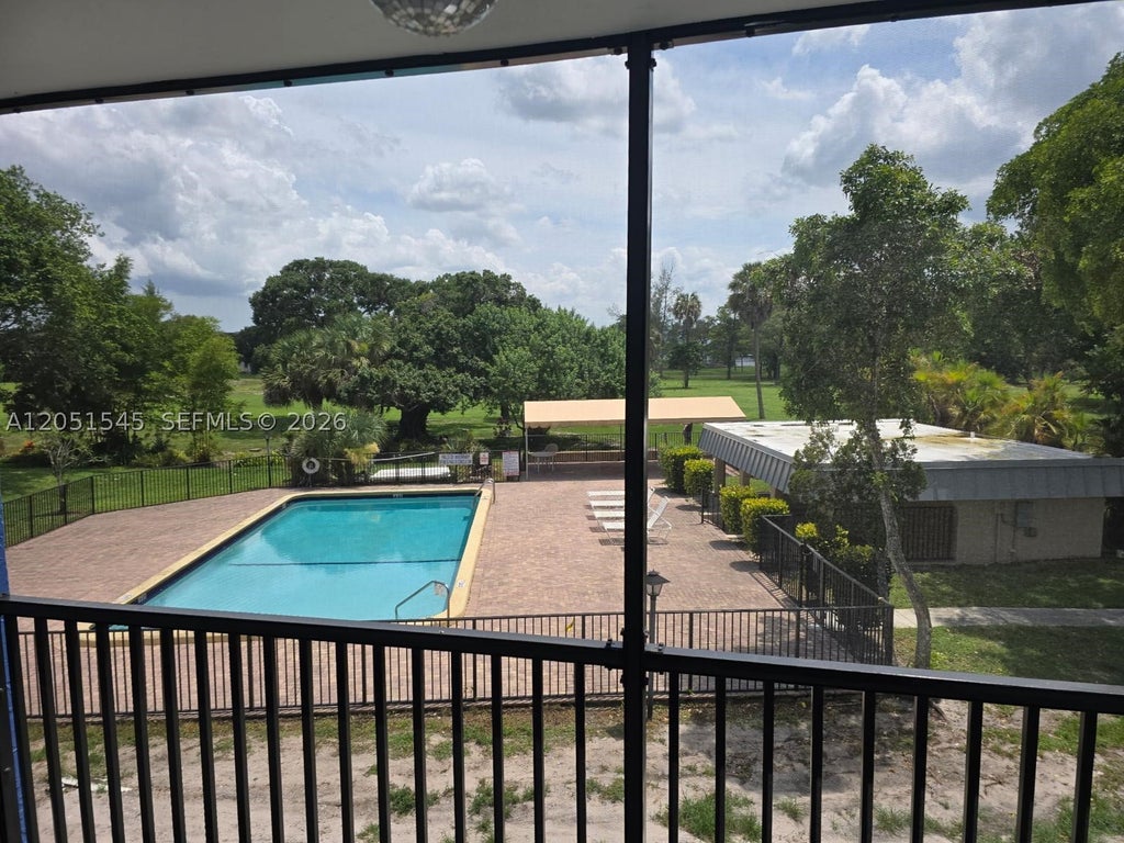 Photo of 6100 S Falls Cir Dr #202, Lauderhill, FL 33319 (MLS # A12051545)