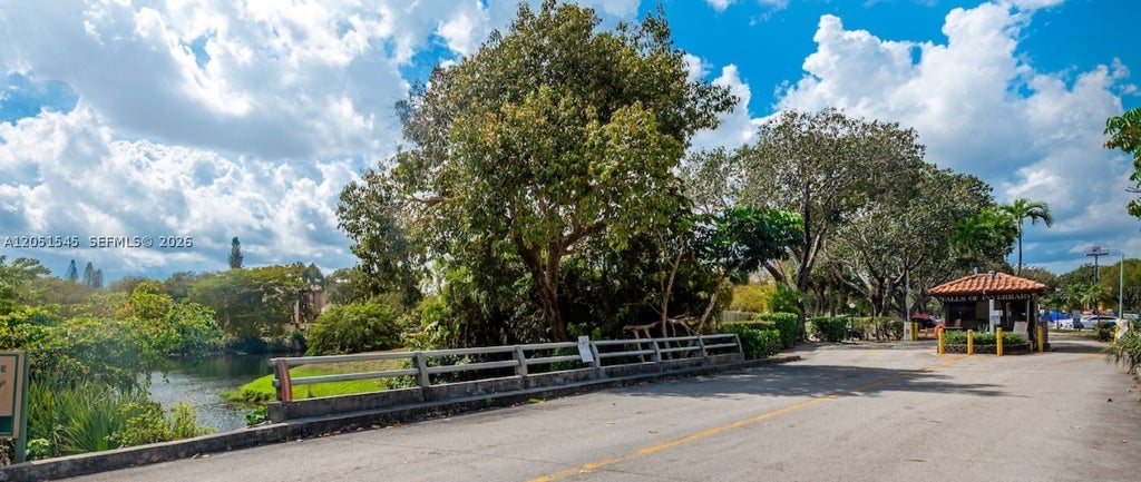 Photo of 6100 S Falls Cir Dr #202, Lauderhill, FL 33319 (MLS # A12051545)