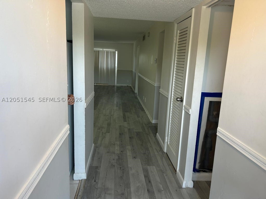 Photo of 6100 S Falls Cir Dr #202, Lauderhill, FL 33319 (MLS # A12051545)