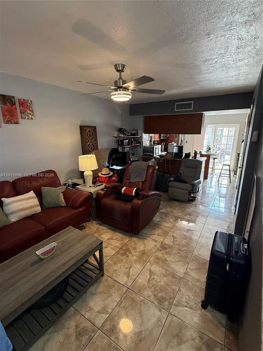 Prime location! This beautiful townhome is situated directly across from FIU, offering convenience and modern living. Featuring a renovated kitchen and stainless steel appliances, this home is perfect for both homeowners and investors. The private patio is great for relaxing or entertaining. Close to major highways, shopping, dining, and public transportation. Don’t miss this opportunity—schedule your showing today! Seller offering $4,500 closing cost credit at full asking price.