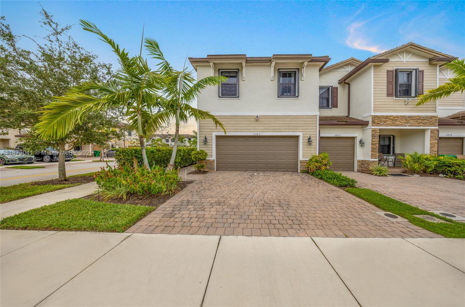 Welcome to this stunning 3-bed, 2.5-bath corner townhouse with a versatile den (convertible to a 4th bedroom) in the pristine Palomino Lake planned community. Features include vinyl and porcelain floors throughout, quartz countertops, custom closet shelving, blinds on all windows, and a spacious 2-car garage. Hurricane-ready with 9 aluminum protective shutters (resistant up to 300 mph winds). Centrally located close to the pool & mailbox, near shopping, Hard Rock, and highways.