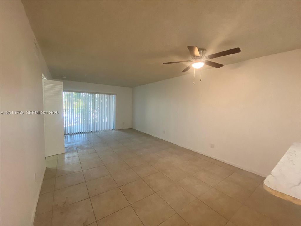 Photo of 3410 Foxcroft Rd #206, Miramar, FL 33025 (MLS # A12019753)