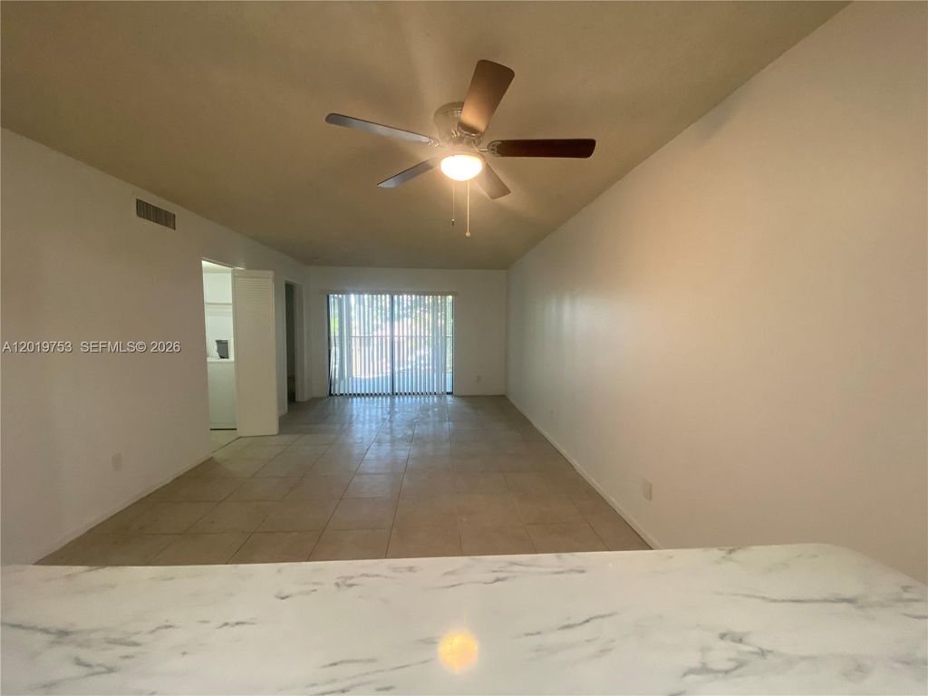 Photo of 3410 Foxcroft Rd #206, Miramar, FL 33025 (MLS # A12019753)
