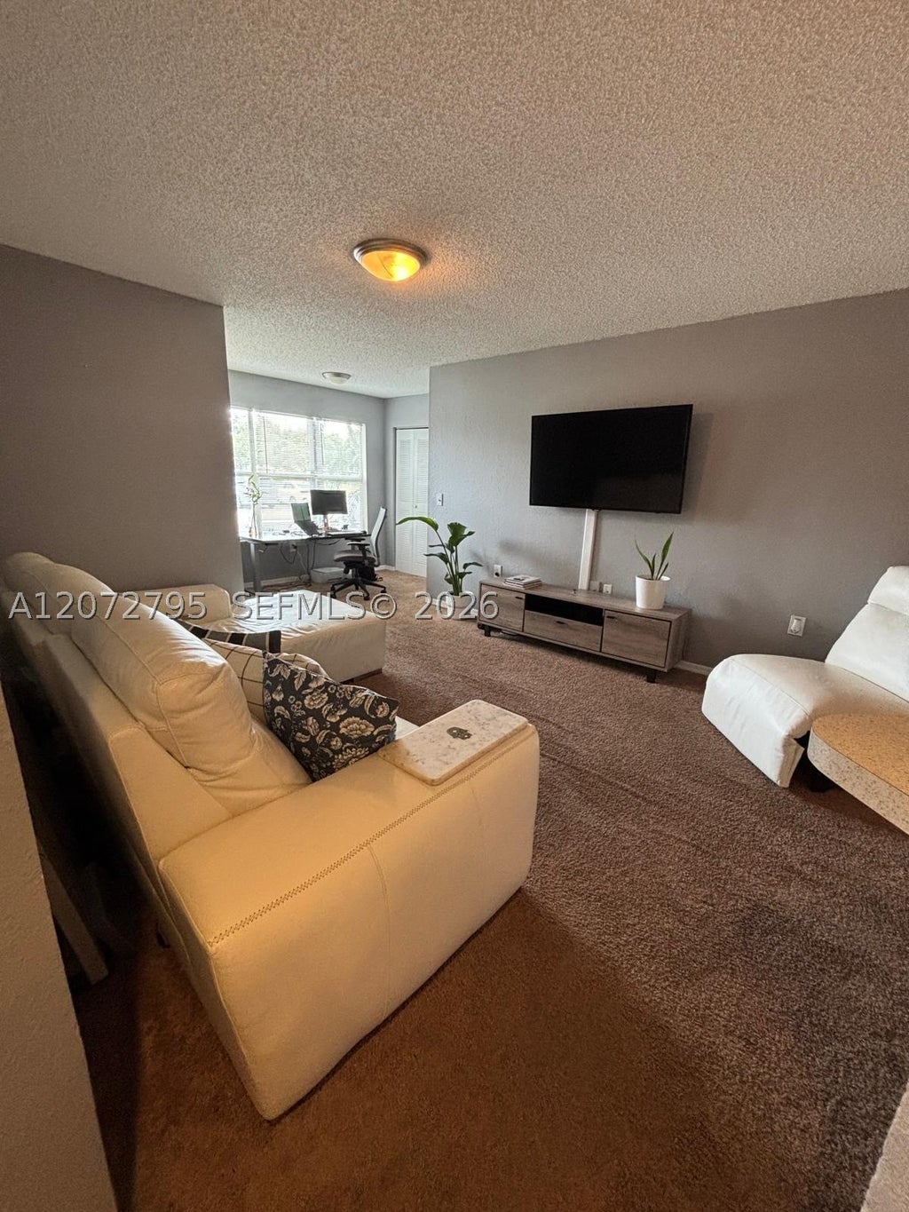 Photo of 12620 Vista Isles Dr #1015, Sunrise, FL 33325 (MLS # A12072795)