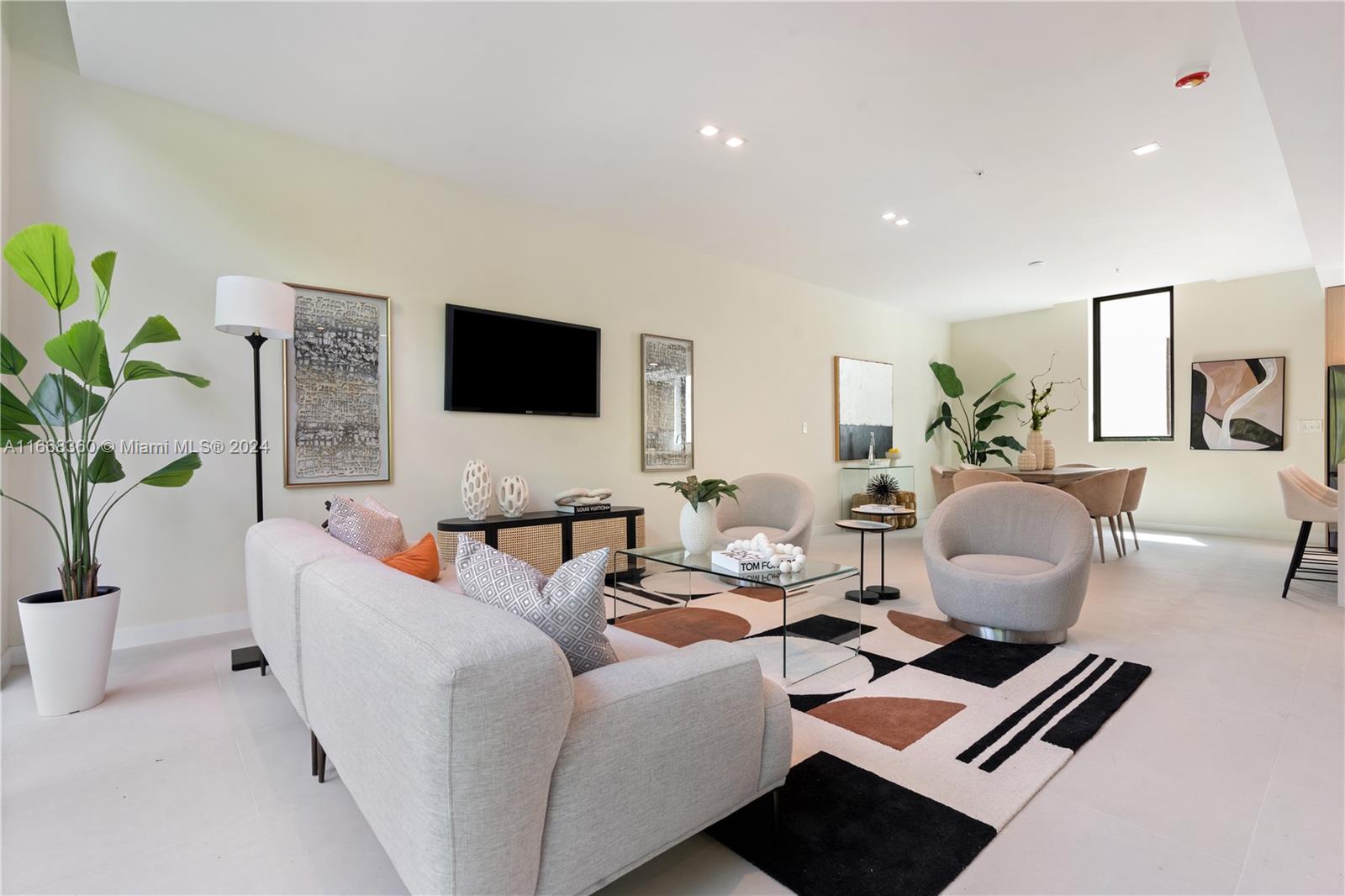 Welcome to charming boutique community of contemporary 3-story townhomes, featuring 3- bed, 3-bath and spacious private wraparound Rooftop terrace that offers a wet bar, space for jacuzzi with stunning views of Miami Skyline. Oversized 2-car garage with plenty of storage space. Ideally located in Silver Grove, minutes away from Coconut Grove marina, fine dining, cafes, shops and more. Whether you are looking for the perfect home or purchasing as an investment, this townhome is an exceptional opportunity.