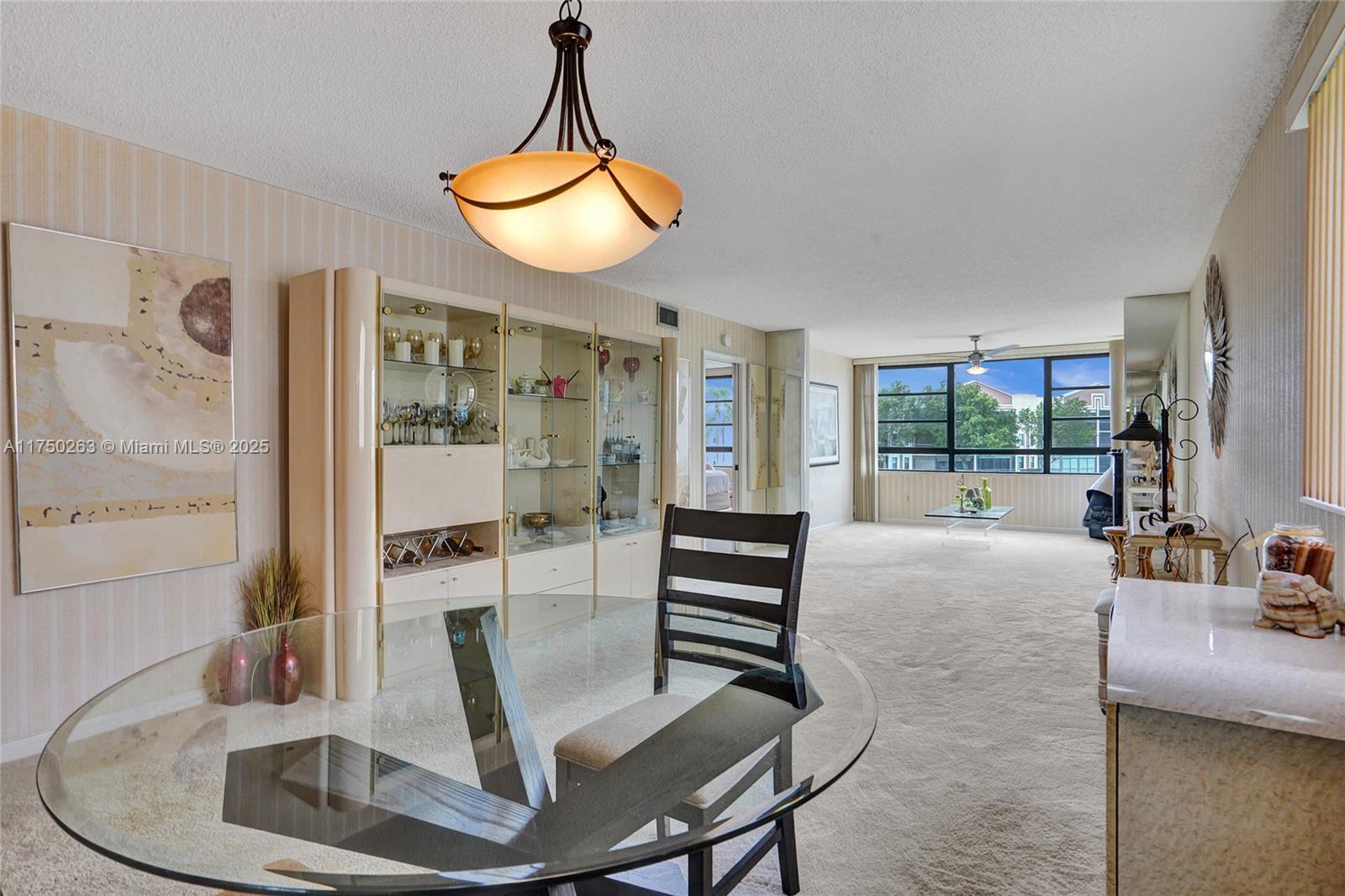Come view this spacious second floor, 2 bedroom/2 bathroom, corner unit with lake views, located in the desirable 55+ community of Clairmont. This home features a split floor plan with a large master and second bedroom, laundry room, eat in kitchen, and a spacious living area overlooking a beautiful lake. For added safety, there is a 24-hour guard gate at the entrance to the community. There are plenty of amenities to fit your lifestyle including an indoor and outdoor pool, shuffleboard, gym, walking paths, billiard room, sauna, card room, theater, live shows, and free transportation buses. This is a great opportunity to enjoy the retired life in sunny South Florida in this beautifully landscaped Clairmont community. This unit is priced to sell and ready to move in. Seller is Motivated!